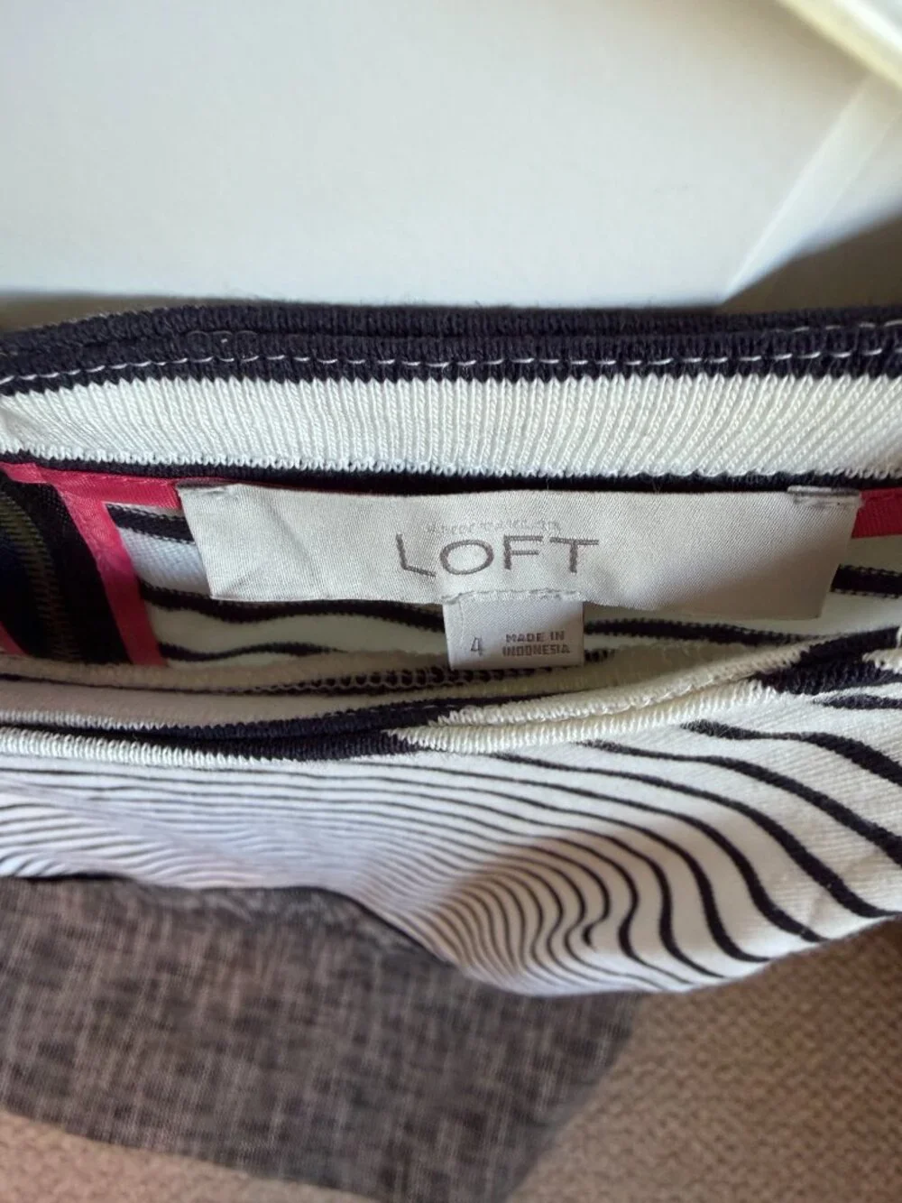 Ann Taylor Loft Black and White Stripe Sheath dress size 4. Two front pockets.